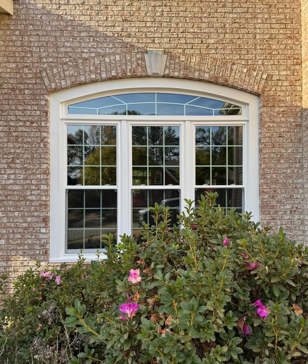 After: arched window in a brick wall